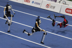 World humanoid robot games show runners breaking records, bursting into flames